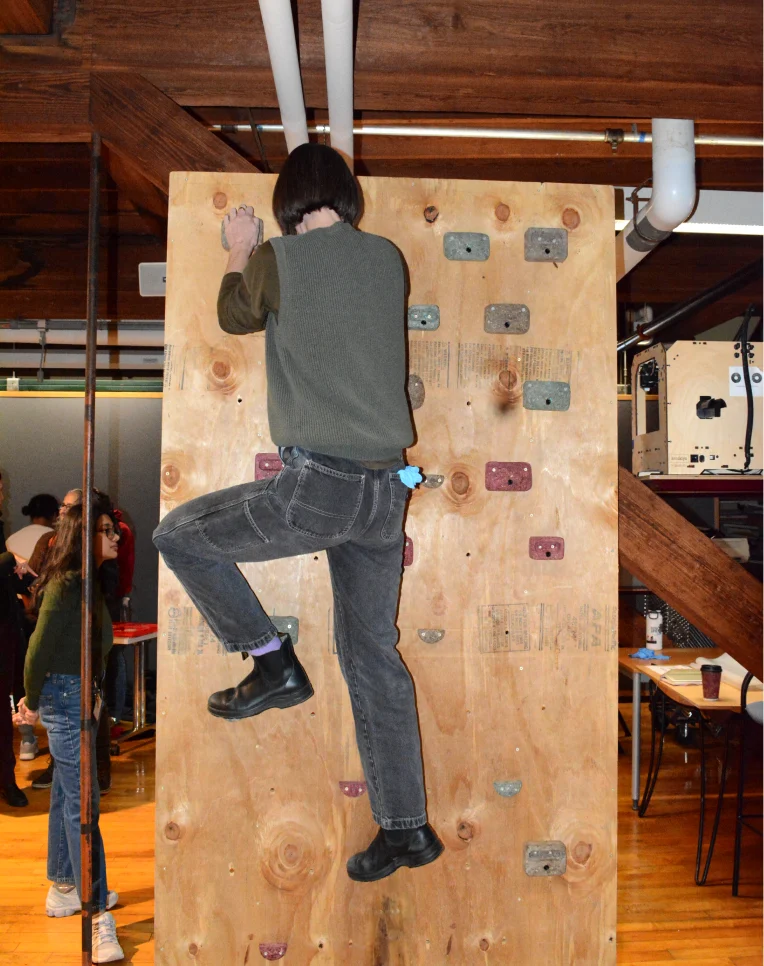 A climber on the wall during the critique