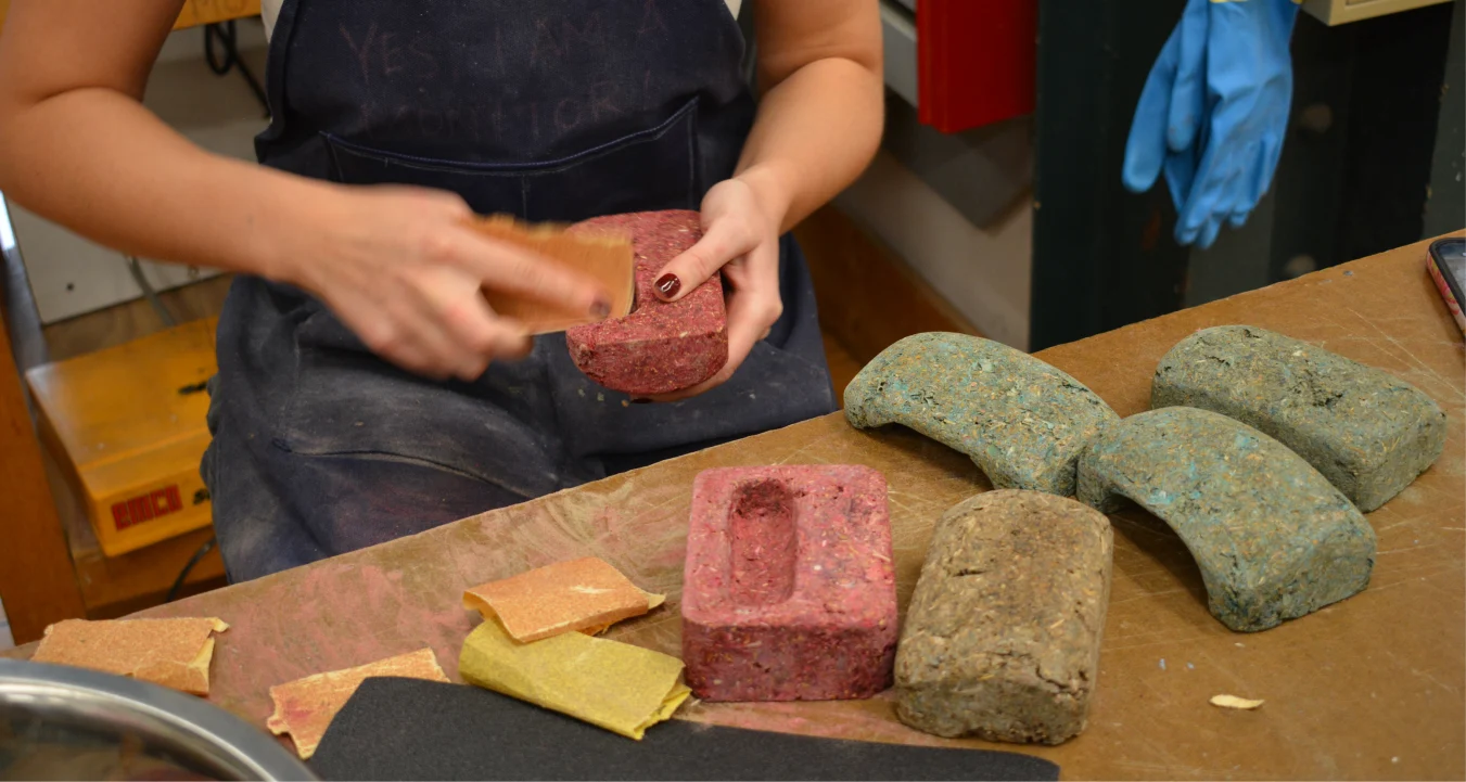Sanding a finished hold beside other holds